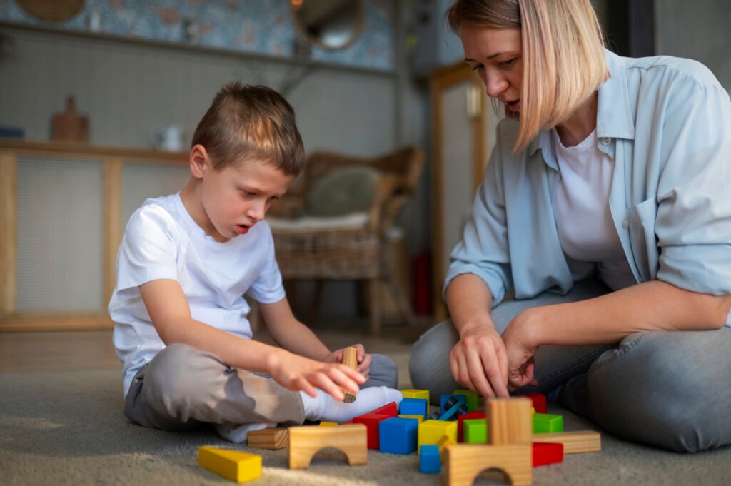 mother-playing-with-her-autistic-son-using-toys