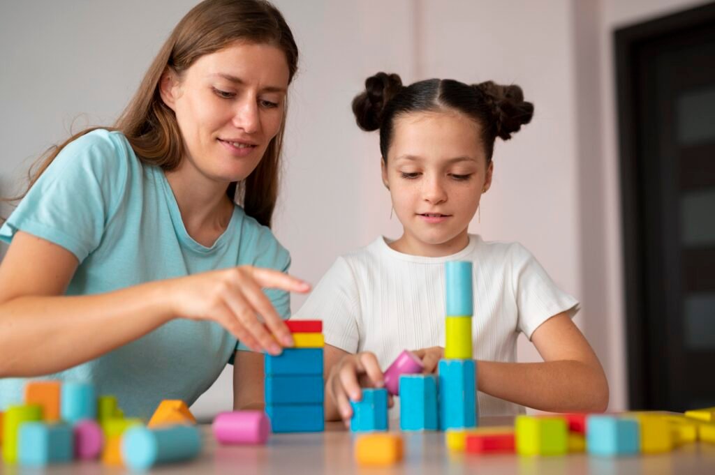 young-female-psychologist-helping-girl-speech-therapy